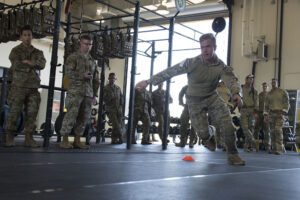 A U.S. Air Force Tactical Air Control Party (TACP) Airman assigned to the 9th Air Support Operations Squadron, Ford Hood, Texas, performs a timed two-cone drill as part of a Tier II Operator Fitness Test during the 2019 Lightning Challenge at Joint Base Lewis-McChord, Wash., July 29, 2019. The Lightning Challenge aims to enhance TACP mission readiness, provide feedback concerning unit training effectiveness, and promote warrior spirit through friendly competition. (U.S. Air Force photo by Staff Sgt. Zade Vadnais)